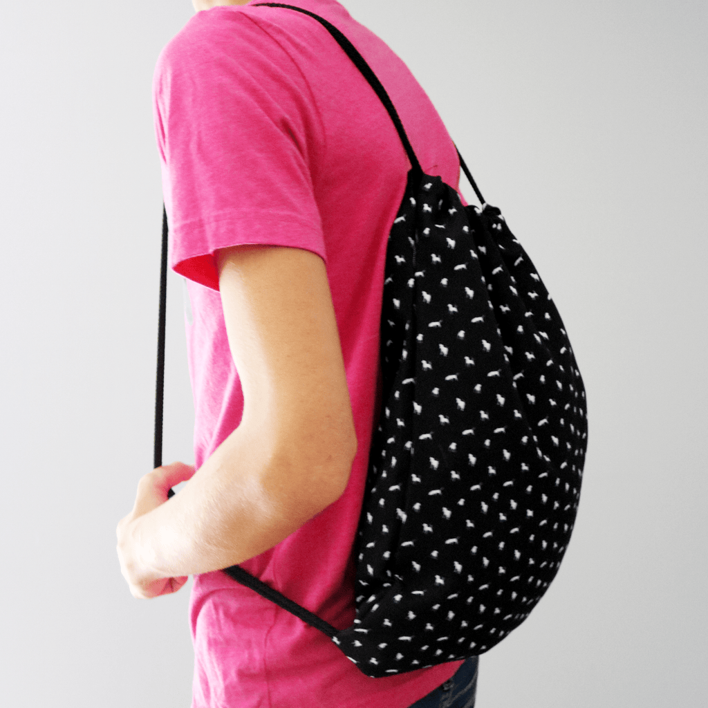 black-critter-print-drawstring-bag