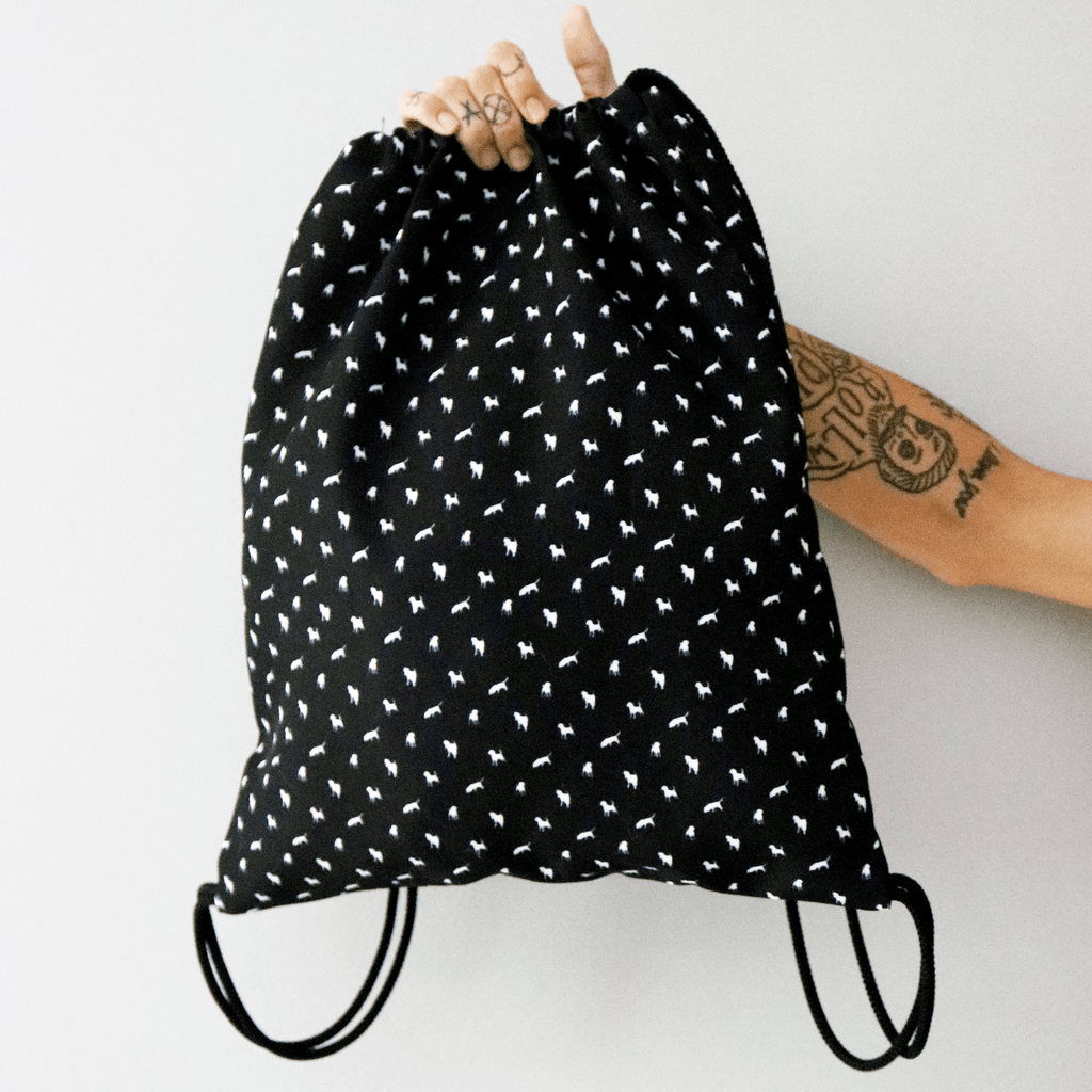 black-critter-print-drawstring-bag